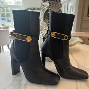 Versace Black Heeled Boots with Gold Buckles